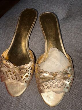 Coach Gold Leather Laser-Cut Bow Mules